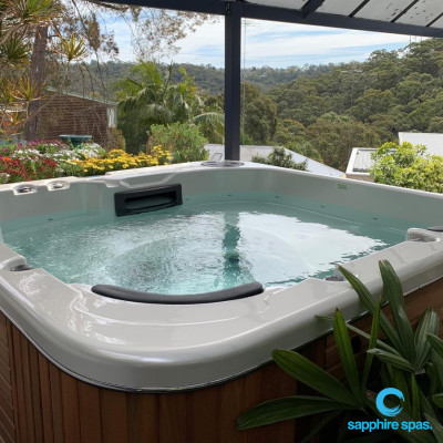 The perfect spot for this silverwhite spa with natural handcrafted western red cedar cabinet