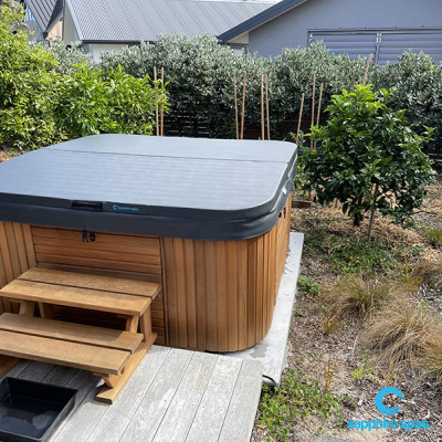 Spa pool dressed in natural timber cabinet thanks to the team @Paramount Pools Tauranga NZ