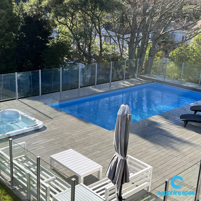 Integrated into the swimming pool decking, this portable spa pool integrates perfectly with the landscape thanks to the team @ Wright Pools & Spas Lower Hutt NZ