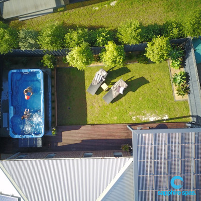 drone shot of swim spa in small backyard in Rosebud